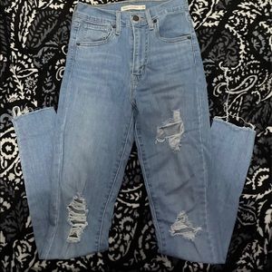 levi distressed jeans size 24
